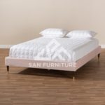pink velvet tufted bed