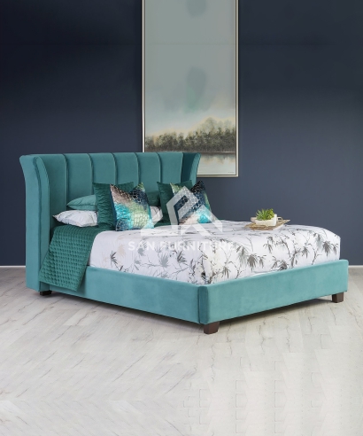 curved upholstered bed